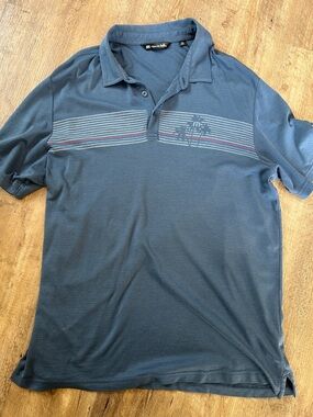Travis Mathew Navy Polo with Chest Stripes